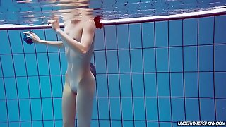 Redhead near blue bikini showing her body