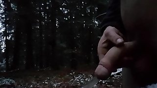 Young man piss in the Forest